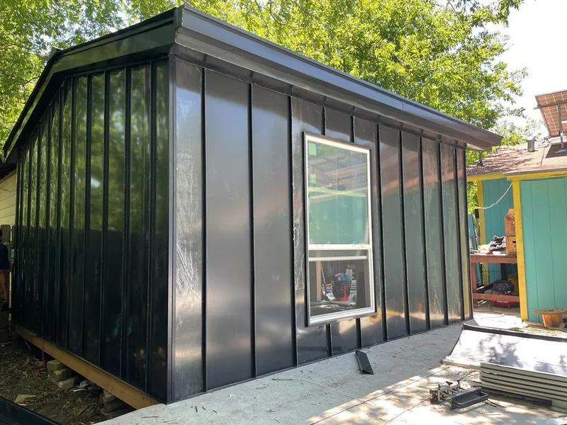 Black standing seam metal wall panels for Roof Inspection in Lanett